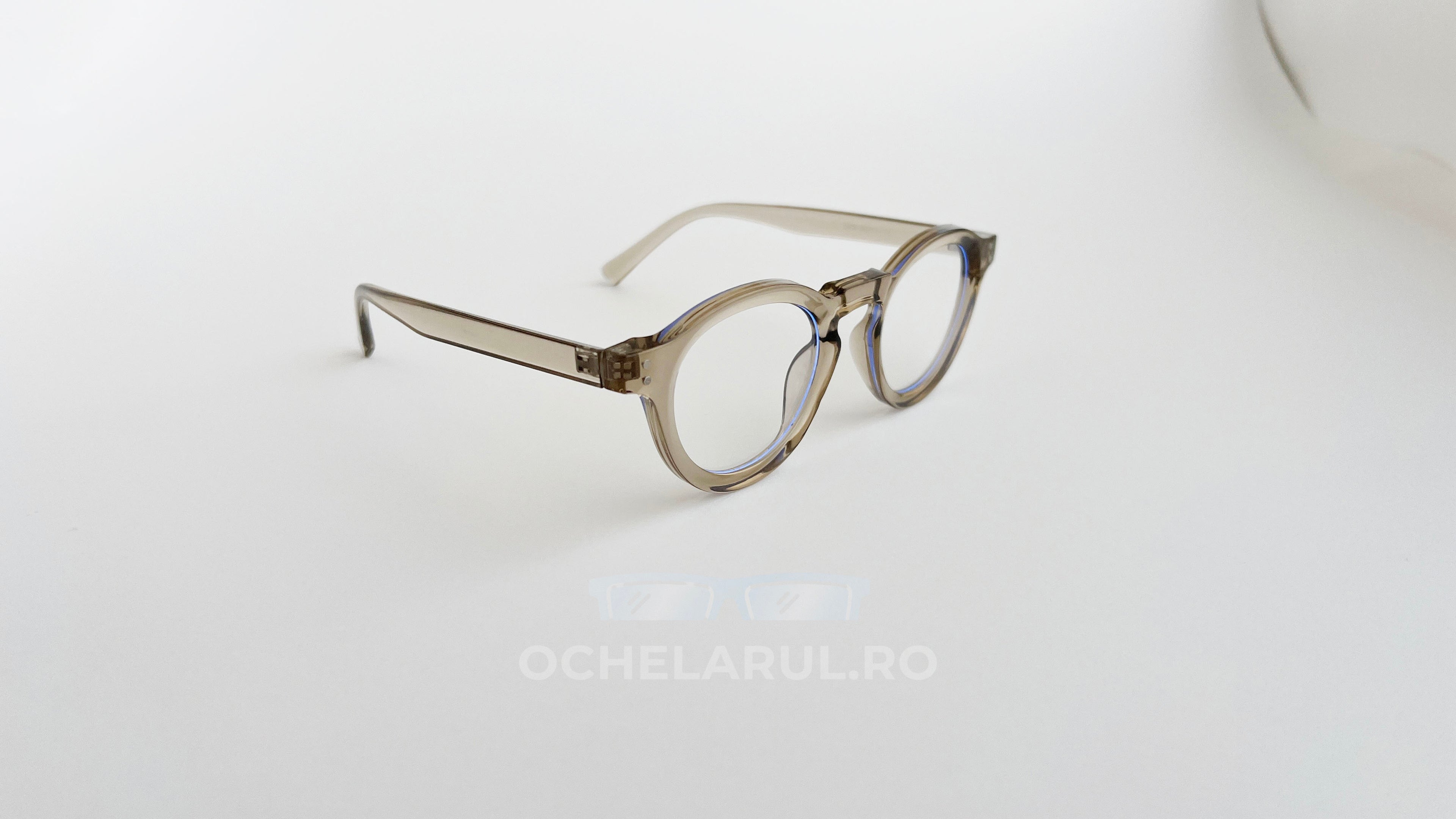 Rame Ochelari Rotunde Groase, culoare bej transparent, design retro cu lentile transparente, stil modern și elegant.