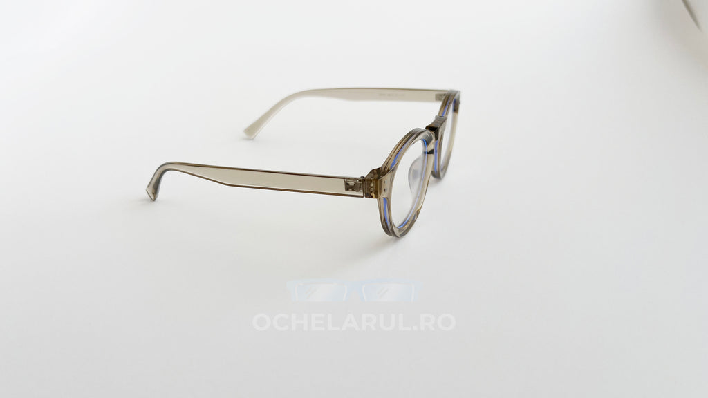 Rame Ochelari Rotunde Groase cu ramă transparent-bej, design retro și lentile clare, elegante și moderne.