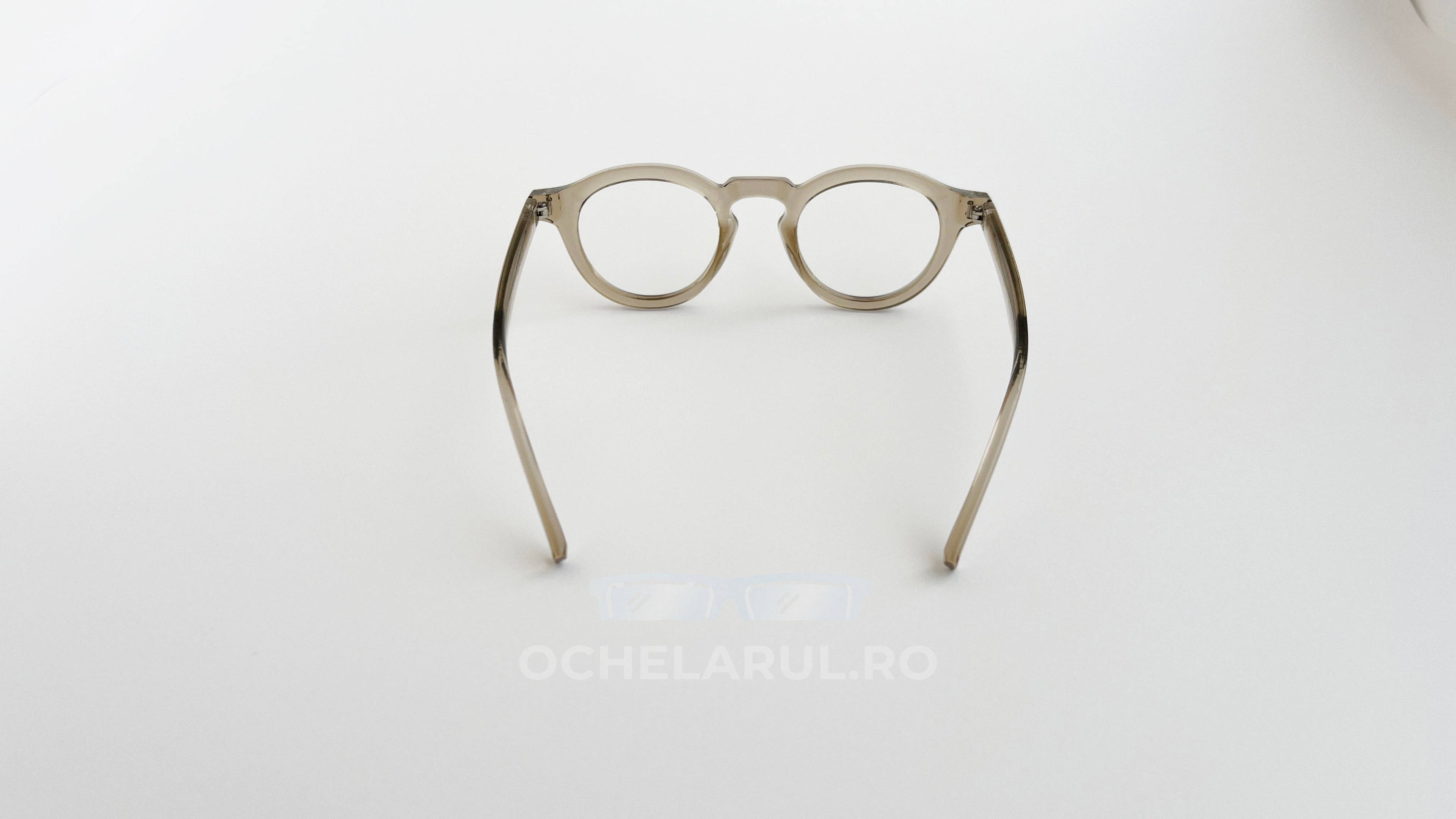 Rame Ochelari Rotunde Groase cu lentile transparente și ramă bej, stil retro, eleganță și confort pentru uz zilnic.