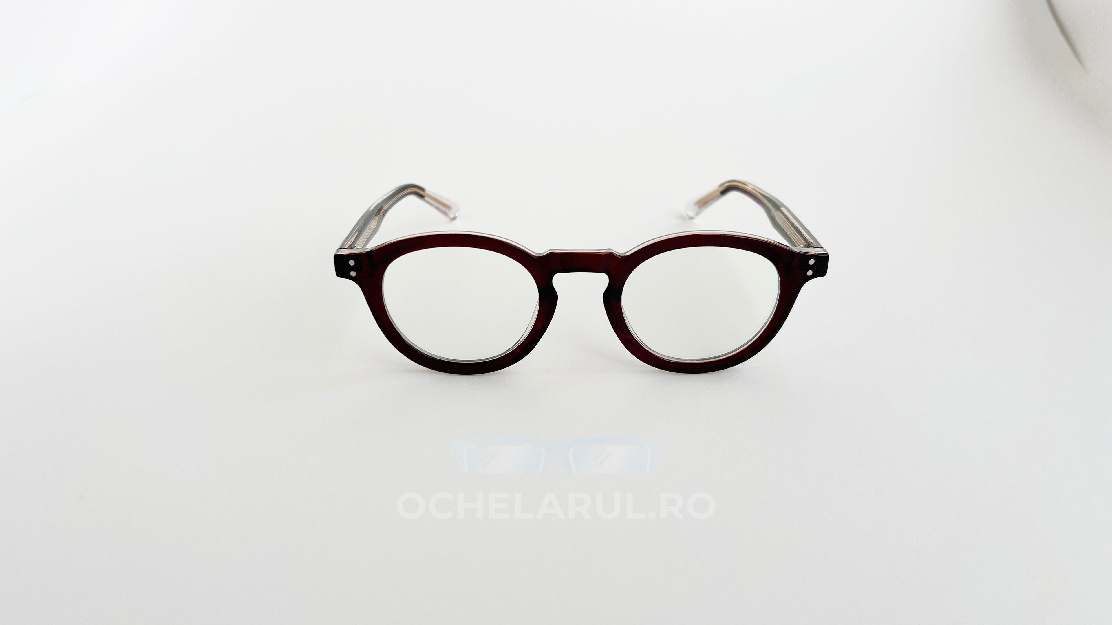 Rame Ochelari Rotunde Groase cu lentile transparente și cadru gros vintage în culoare visinie, minimaliste.