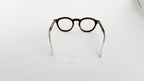 Rame Ochelari Rotunde Groase cu lentile transparente și cadru gros, de culoare visinie, design retro simplu și elegant.